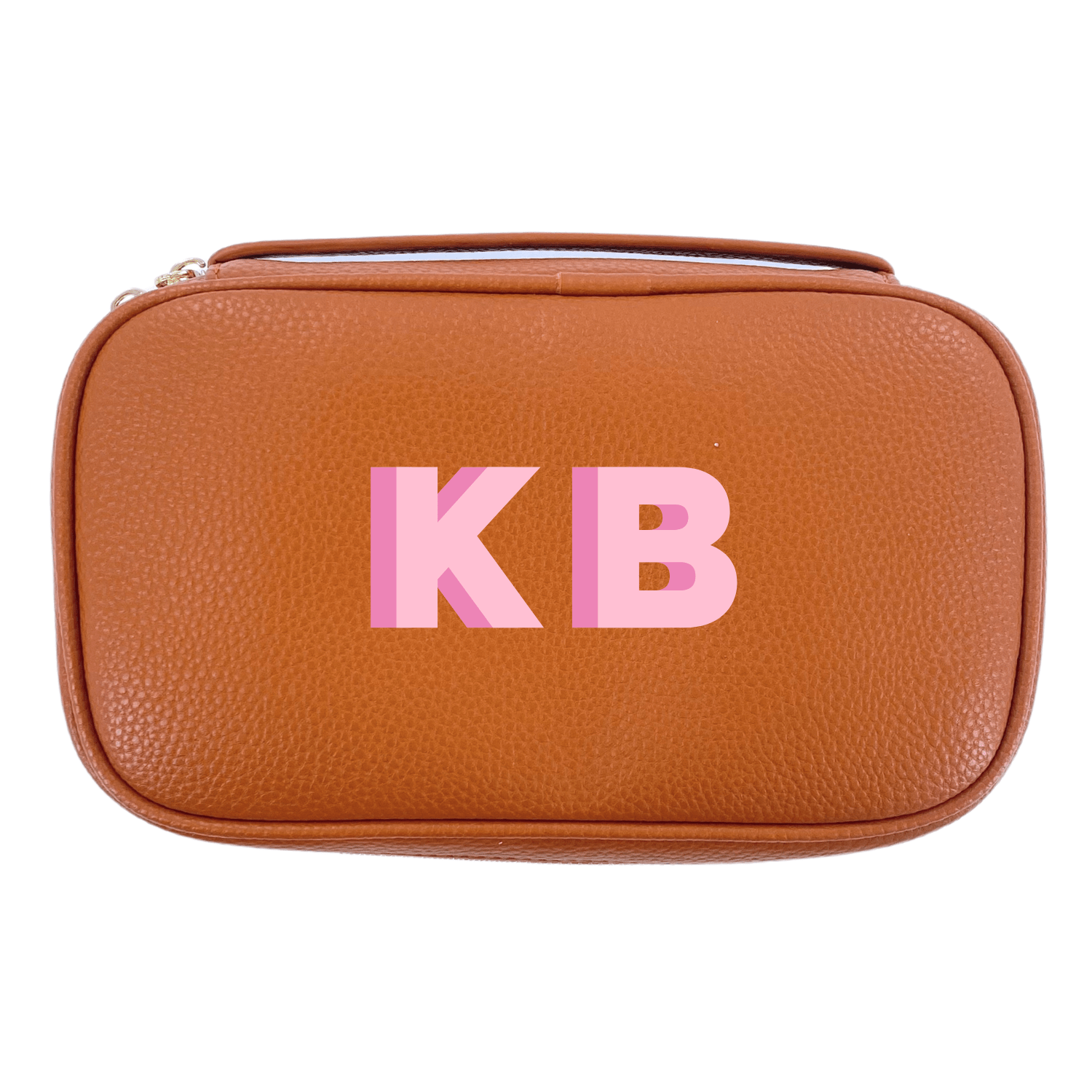 The image showcases a personalized travel jewelry case from Sprinkled With Pink, featuring a rich tan leather-textured exterior with bold pink monogrammed initials "KB." This stylish and compact case is part of a customizable set, allowing for various monogram styles and color options to match individual preferences. Designed for both functionality and elegance, the case is perfect for keeping jewelry and small essentials organized while traveling, making it an ideal personalized gift for any occasion.