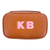 The image showcases a personalized travel jewelry case from Sprinkled With Pink, featuring a rich tan leather-textured exterior with bold pink monogrammed initials "KB." This stylish and compact case is part of a customizable set, allowing for various monogram styles and color options to match individual preferences. Designed for both functionality and elegance, the case is perfect for keeping jewelry and small essentials organized while traveling, making it an ideal personalized gift for any occasion.